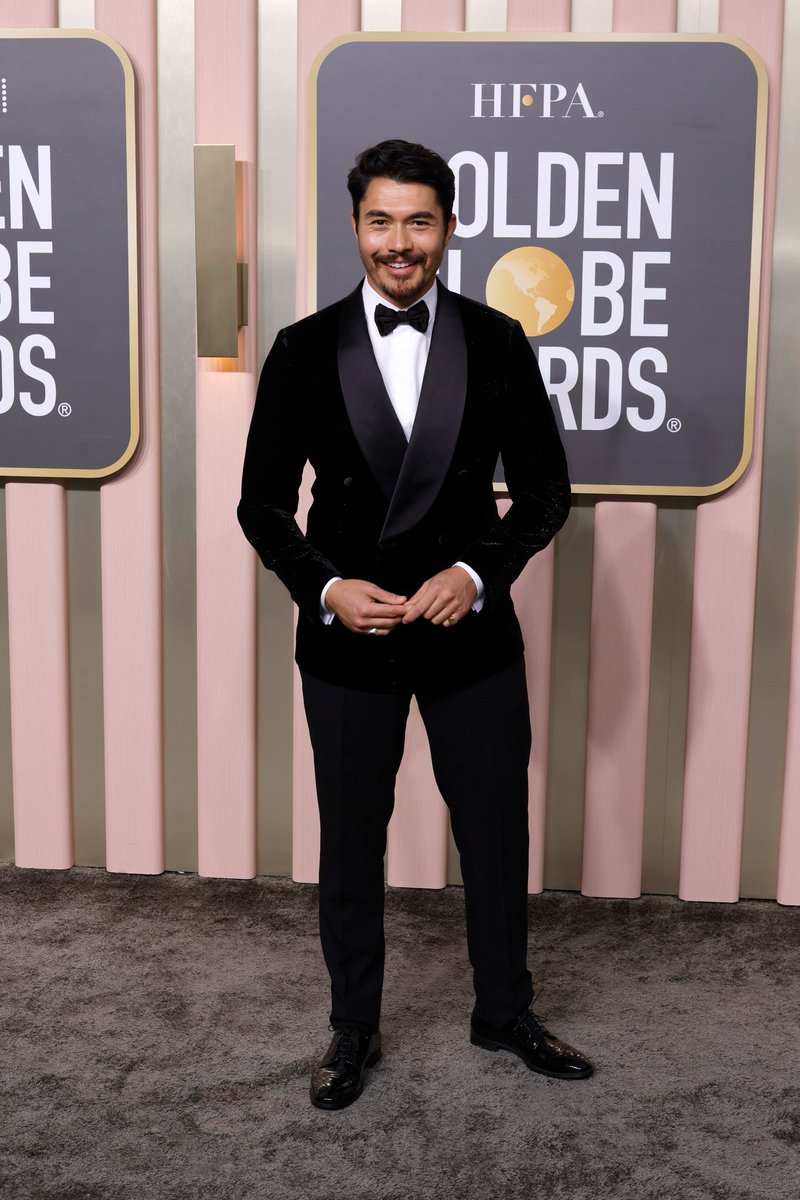 .#MichelleYeoh chose a blue #GiorgioArmaniPrivé strapless gown embroidered with crystals and sequins to receive the Golden Globe. #TaronEgerton chose a navy Giorgio Armani tuxedo to attend the Award Ceremony as did presenters #SeanPenn and #HenryGolding.

#ArmaniStars