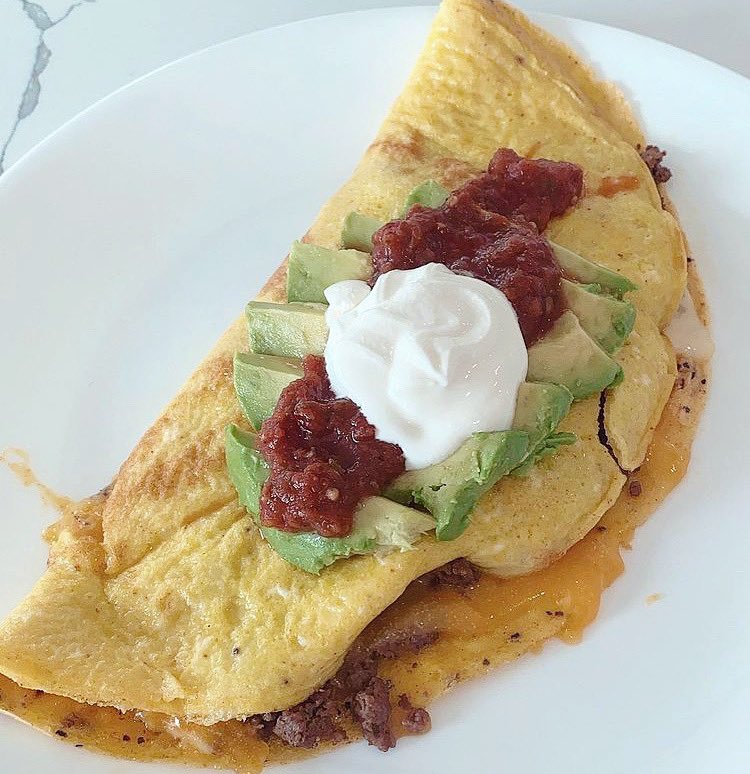 EYHOEdibles's tweet photo. Now that’s what I call breakfast! 

This Mexican-style omelet is a beaut, not to mention protein💪🏽packed with cheddar cheese🧀, ground beef and topped with avocado 🥑 + salsa!

#omelet #omeletforbreakfast #mexicanomelet #proteinbreakfast #eggsforthewin #eggsforbreakfast https://t.co/iYa3Qsz892