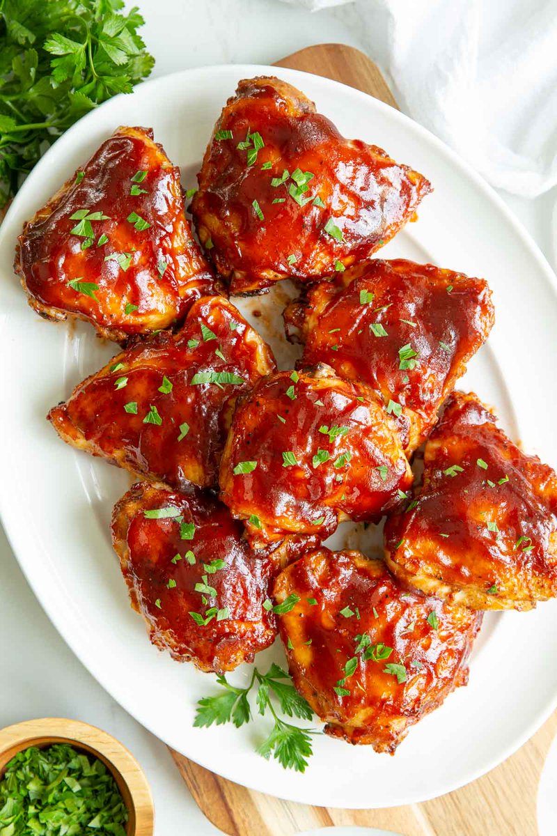 These flavor-packed oven baked BBQ #Chicken Thighs are an easy and budget-friendly dinner perfect for any night of the week!  bit.ly/3k3Lqu1