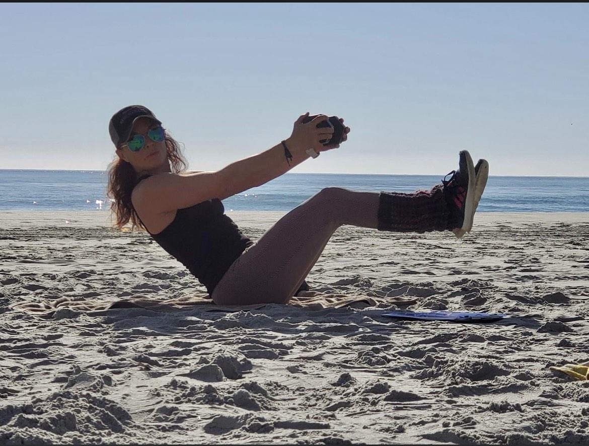 The75F's tweet photo. My client To this of me this morning!..lol.. so #exerciseoftheday is “Hold the World” grab a #dumbbell and tighten that #core #fitnessgirl #fitover40 #beachworkout https://t.co/ysBQ4TfFrt