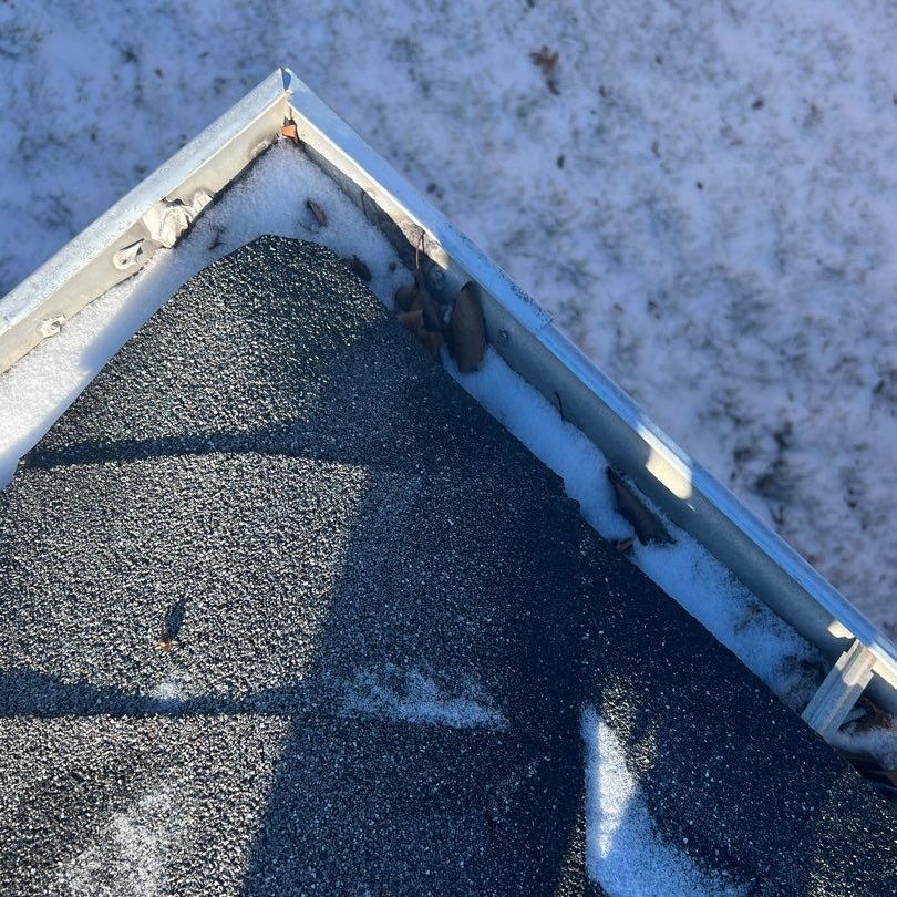 showmeroofs's tweet photo. Here is an example of snow and debris caught in a gutter. Although it doesn't look like much, this added pile-up can cause excess damage that you do not want! https://t.co/6EwKcVQyTD