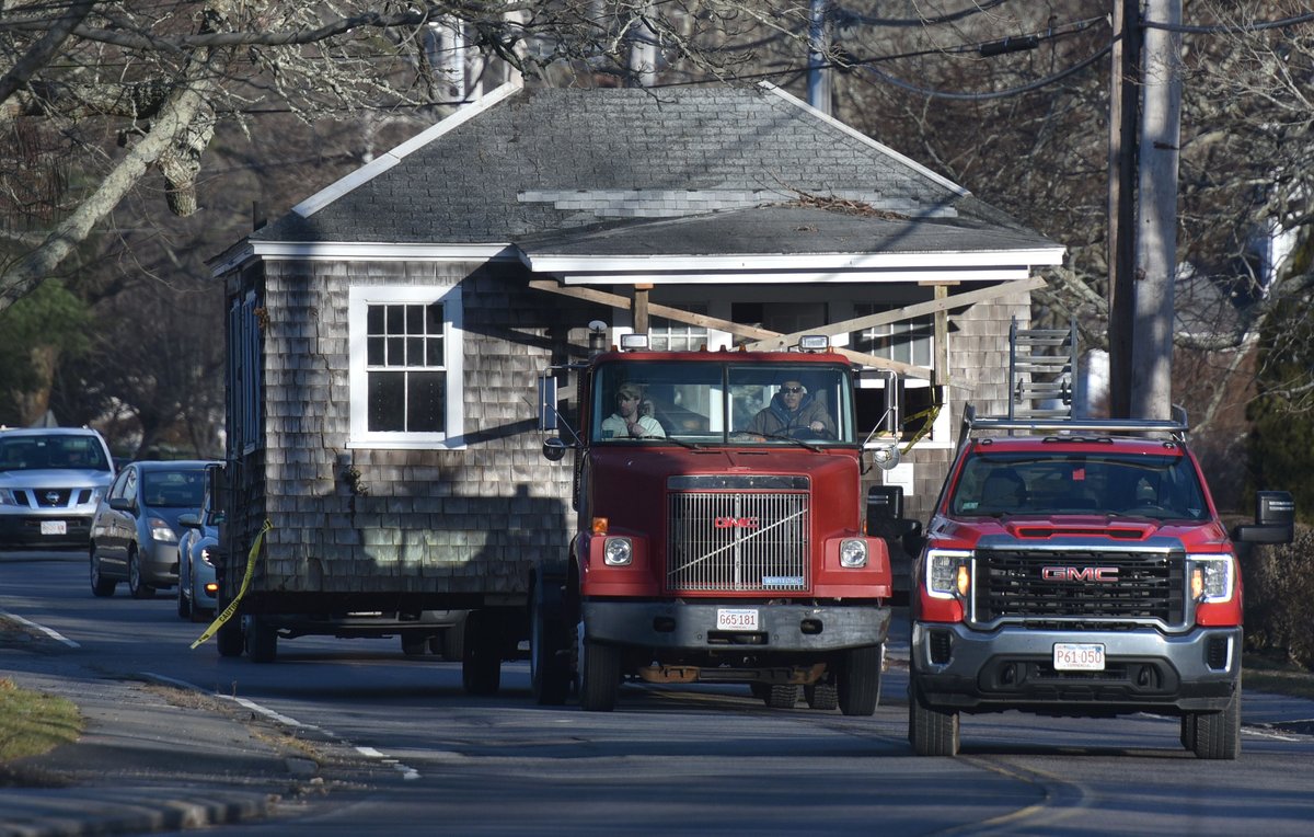cctphoto's tweet image. Special Delivery: Driver Mark Barros, with Hayden Buidling Movers, joins the morning commute pulling the old 1800's era Wianno Post Office from its former location in Cotuit to a new home on the grounds of the Osterville Historical Museums. @capecodtimes