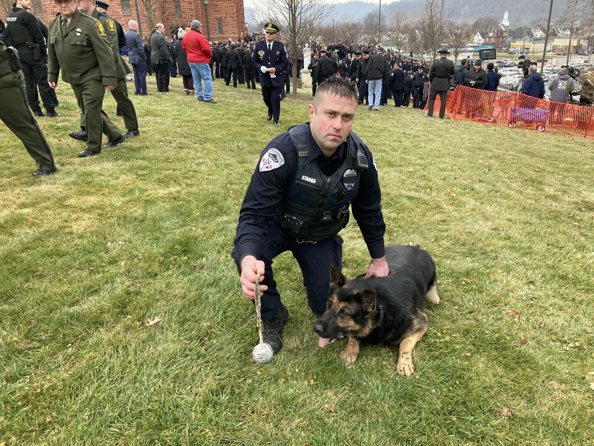 MaThomas_Trib's tweet photo. At least a half dozen Police dogs lined the route of Brackenridge Police Chief Justin McIntire’s funeral. Here is Officer Josh Stanga of Wilkinsburg Police with Titan. https://t.co/EGMPVisdQB