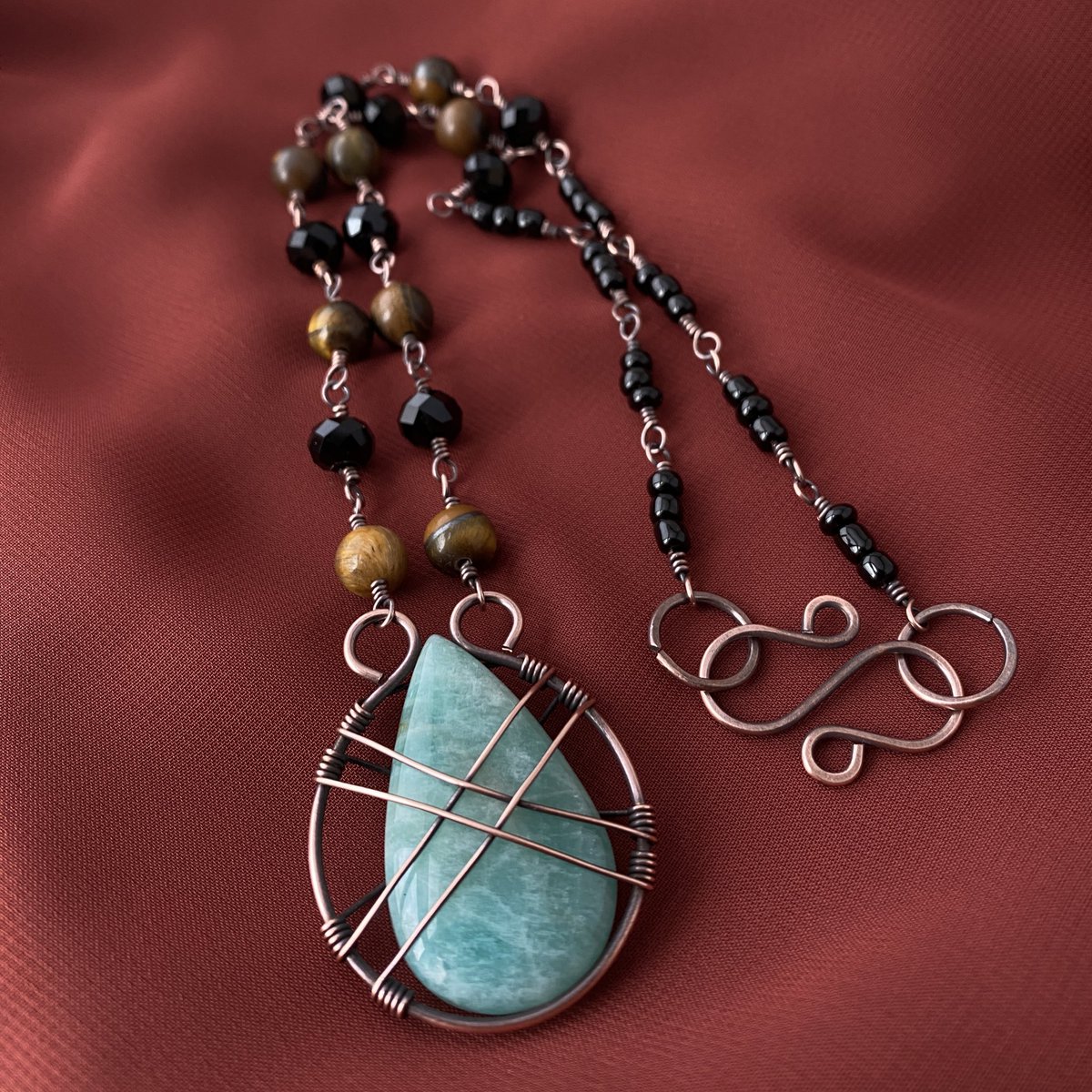 SuLuzCo's tweet photo. Amazonite pendant and tiger eye beads copper necklace

#etsy #EtsySeller  #handmadejewelry #etsyshop https://t.co/IYGtEEU1pe