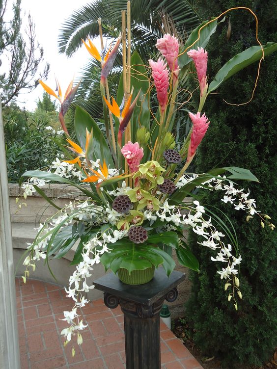Large tropical flower arrangements consisting of Bird of paradise flower, ginger flower, orchids, and tropical foliage's #orchids #tropicalflowers