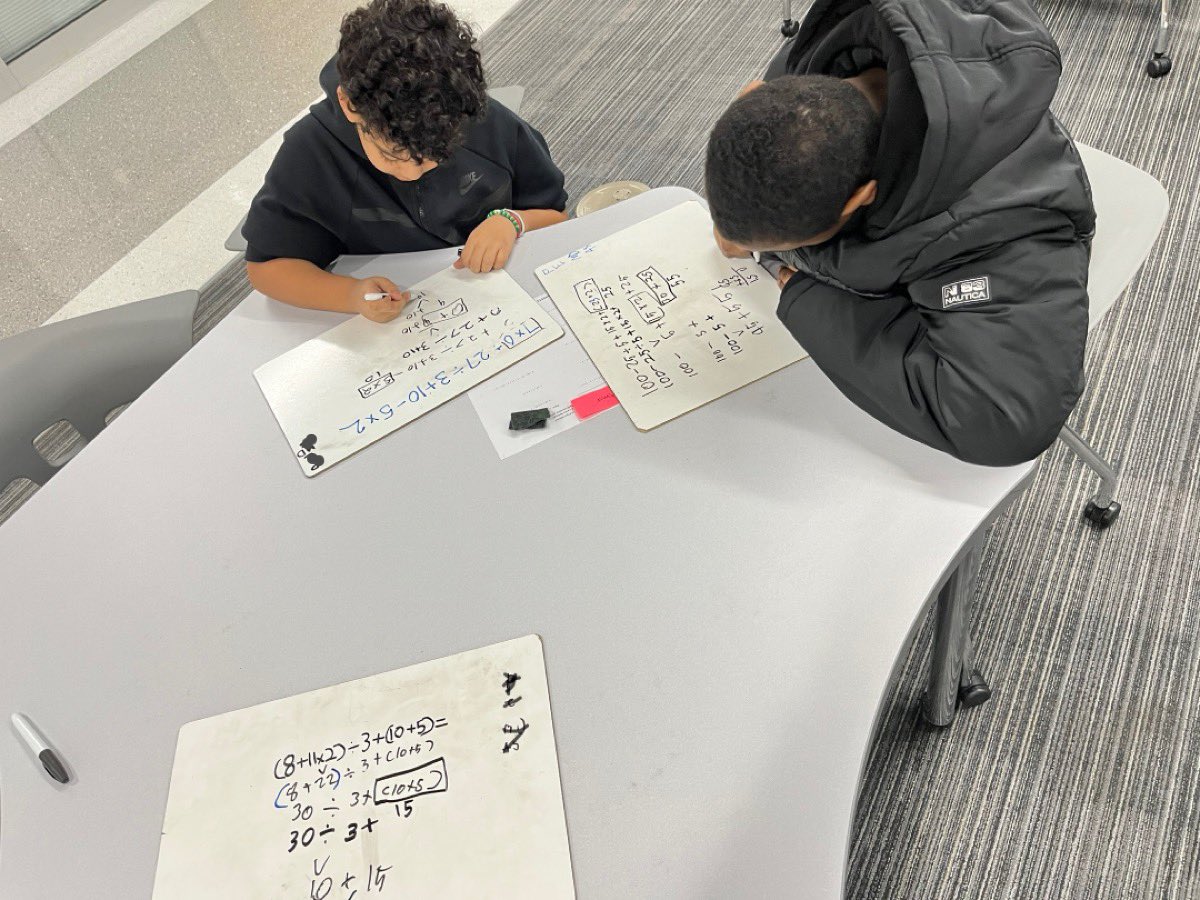 My hardworking first period class each took turns solving 1 step at a time and passing the problems around the table until they all were completed! <a href="/ShoresMiddle/">Potomac Shores Middle School</a> #ShoresMiddle