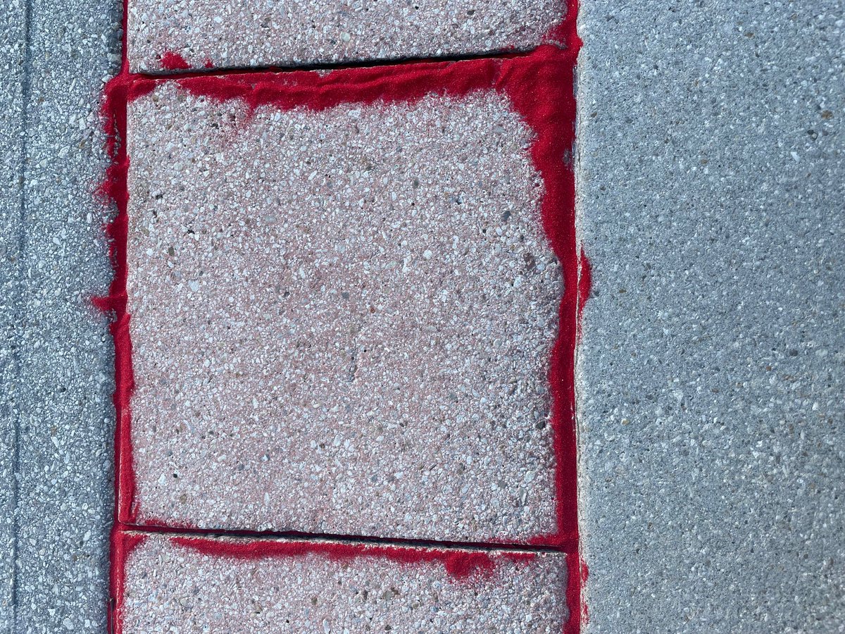 StateAttorney15's tweet image. In recognition of National #HumanTraffickingAwarenessDay, we filled in sidewalk cracks in front of our downtown West Palm Beach office building. This is to highlight the ways people are vulnerable to exploitation. #RedSandProject