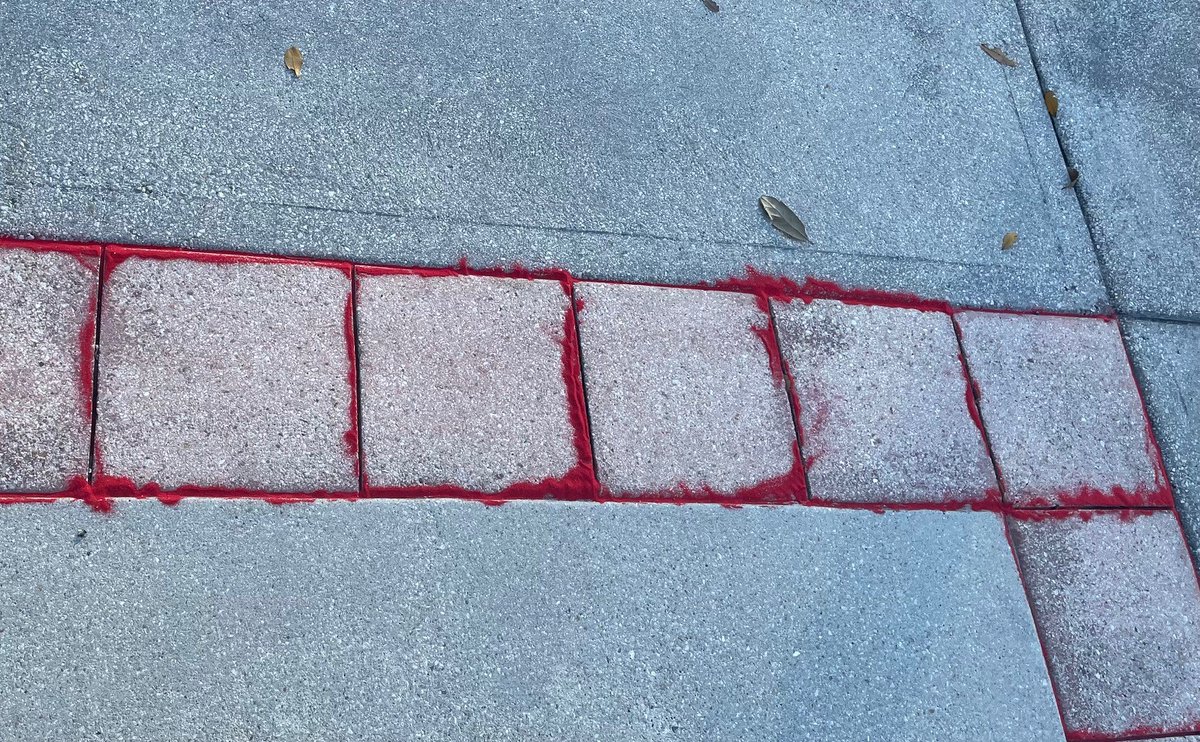StateAttorney15's tweet image. In recognition of National #HumanTraffickingAwarenessDay, we filled in sidewalk cracks in front of our downtown West Palm Beach office building. This is to highlight the ways people are vulnerable to exploitation. #RedSandProject
