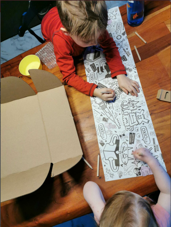 oxio_internet's tweet photo. A customer sent this photo over to us of their kids colouring some of the #oxio wrapping paper with the crayons we send over in every box. :') True artists in the making. https://t.co/ifHfhh1m4U