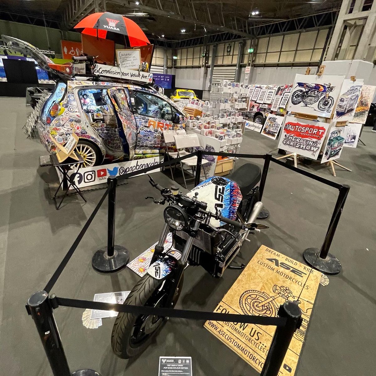 Popbangcolour's tweet photo. Ta-dah! @Autosport_Show stand setup is done, HUGE thank you to the companies who’ve supplied display vehicles for the POPBANGCOLOUR stand in hall 4 (stand 4250) 

Show opens tomorrow until Sunday you’ll find me inbetween @OMGRacingUK &amp; @f1inschoolsUK 

#ASI #AutosportShow #ASI23 https://t.co/Nyr1AGczB8