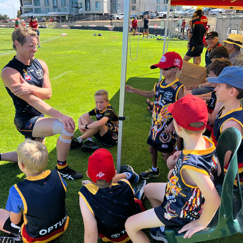Adelaide_FC's tweet photo. We had a very special guest at training this week. Thanks for visiting, Enzo 😊 

#weflyasone @CrowsFoundation