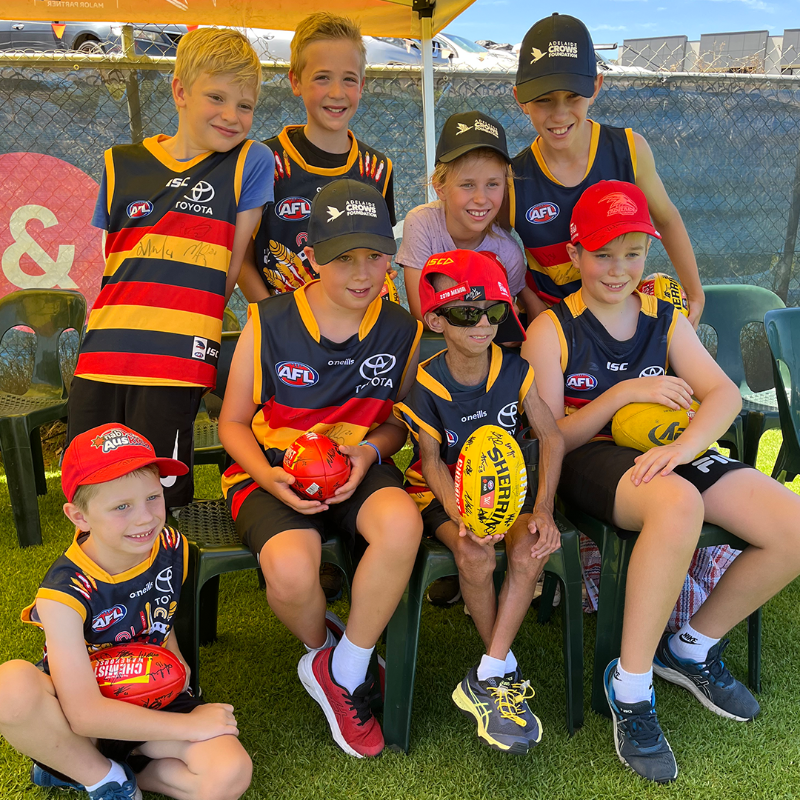 Adelaide_FC's tweet photo. We had a very special guest at training this week. Thanks for visiting, Enzo 😊 

#weflyasone @CrowsFoundation
