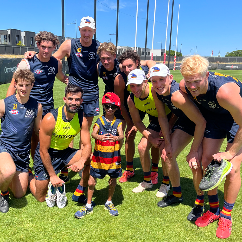 Adelaide_FC's tweet photo. We had a very special guest at training this week. Thanks for visiting, Enzo 😊 

#weflyasone @CrowsFoundation