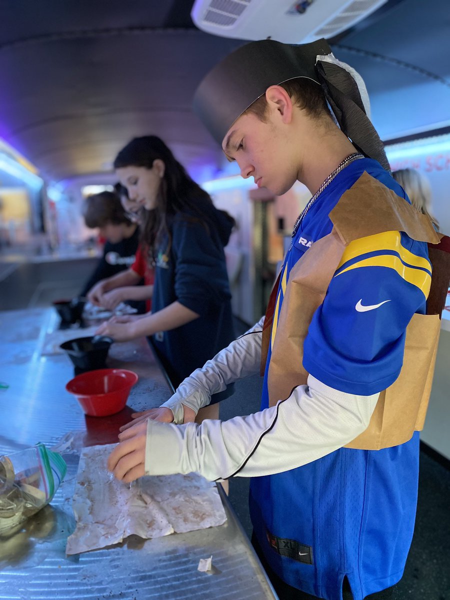 VanSTEAMBus's tweet photo. Giving our 7th grade the #Alamo experience today by
🫘 Taste testing staple foods
🤠 Davy Crockett dress up contest
📱 Virtually touring the church
✂️ Making games out of study tools &amp; 
☕️ Using DIY methods to antique their own William B. Travis letter! 
#WeAreVan #STEAM https://t.co/fC5HFwO1bm