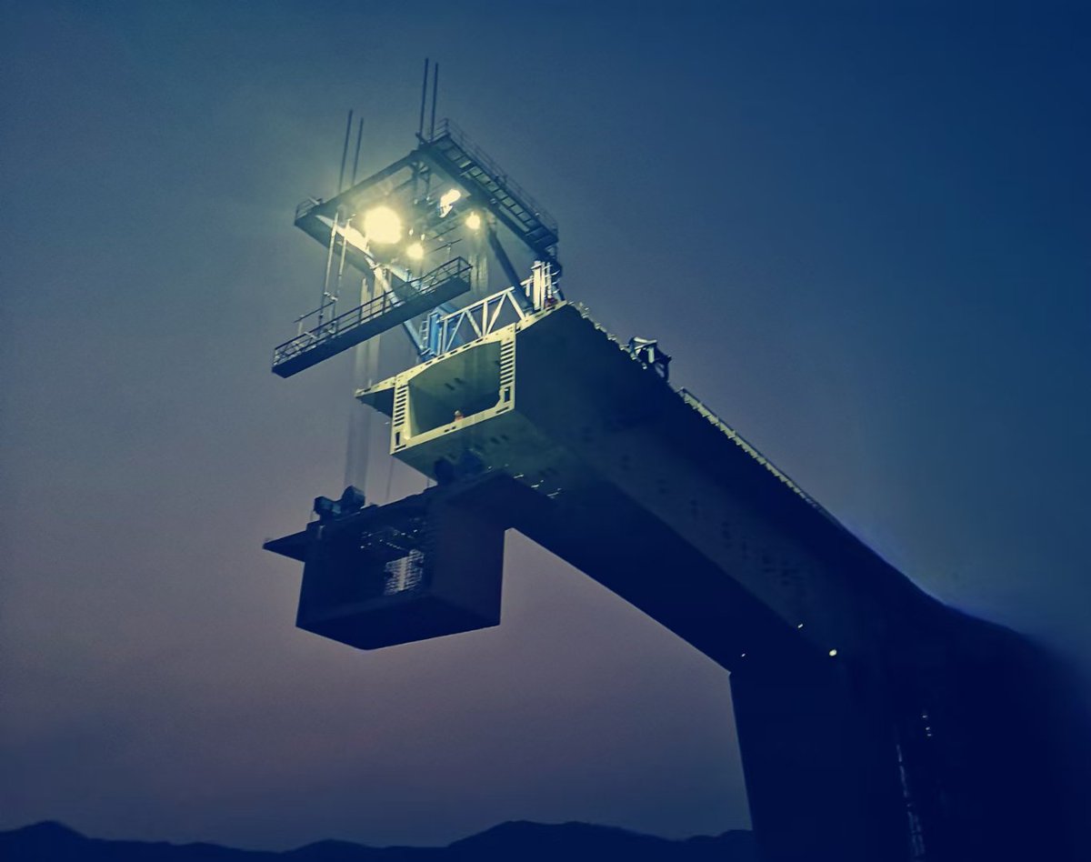 Beautiful night shot at bridge construction site. The segment lifter shown in the picture supplied by Hansal Group being used for cantilever bridge construction.

#bridgeconstruction #cantilevelmethod #formworktraveler #highwaybridgeconstruction #segmentlifter