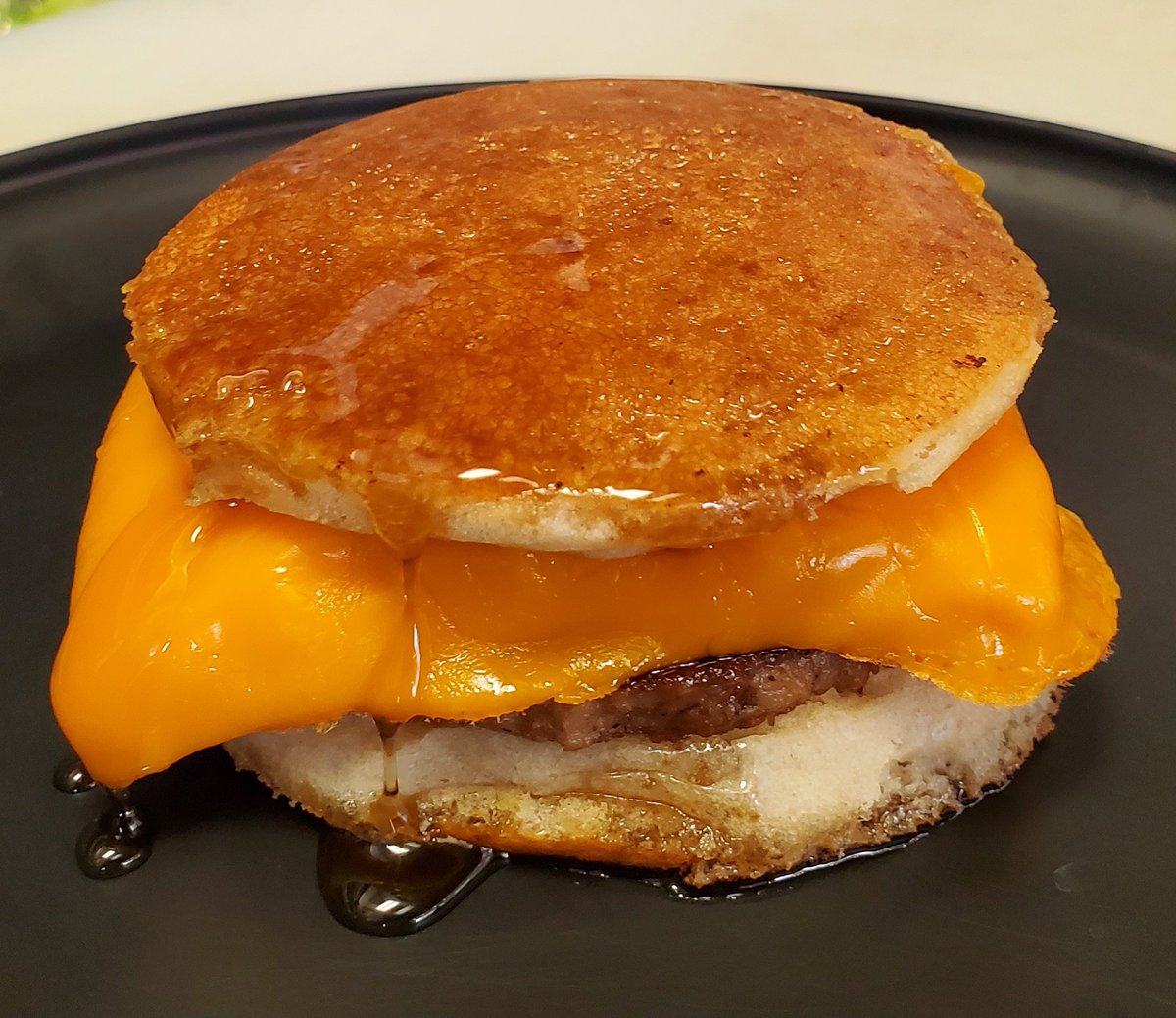 McGriddle,  but #Vegan . With <a href="/ImpossibleFoods/">Impossible Foods</a> sausage, JUST egg and cheese. All new at alldayvegan.cafe (our newest concept). Comfort food and breakfast all day.