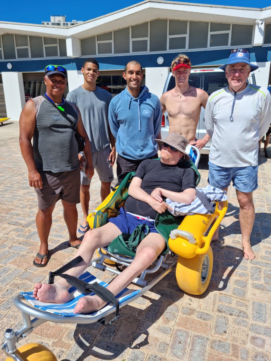 LifesavingSA's tweet photo. Our lifeguards from Kings Beach and Seagulls are humbled to have been able to assist a disabled man from Joburg in experiencing the ocean for the first time in 20 years.

#DHLLifesaving #LifesavingSA #DrowningPrevention https://t.co/56L3dP618a