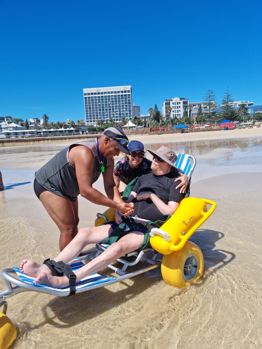 LifesavingSA's tweet photo. Our lifeguards from Kings Beach and Seagulls are humbled to have been able to assist a disabled man from Joburg in experiencing the ocean for the first time in 20 years.

#DHLLifesaving #LifesavingSA #DrowningPrevention https://t.co/56L3dP618a