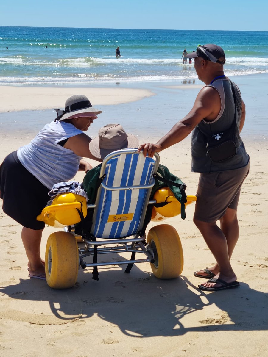 LifesavingSA's tweet photo. Our lifeguards from Kings Beach and Seagulls are humbled to have been able to assist a disabled man from Joburg in experiencing the ocean for the first time in 20 years.

#DHLLifesaving #LifesavingSA #DrowningPrevention https://t.co/56L3dP618a