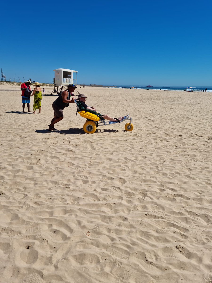 LifesavingSA's tweet photo. Our lifeguards from Kings Beach and Seagulls are humbled to have been able to assist a disabled man from Joburg in experiencing the ocean for the first time in 20 years.

#DHLLifesaving #LifesavingSA #DrowningPrevention https://t.co/56L3dP618a