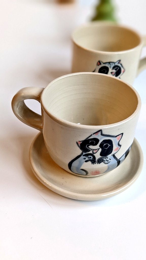 _kness's tweet photo. Variations on the raccoon espresso cup and saucer 🦝☕ https://t.co/zf9IfEuo9E