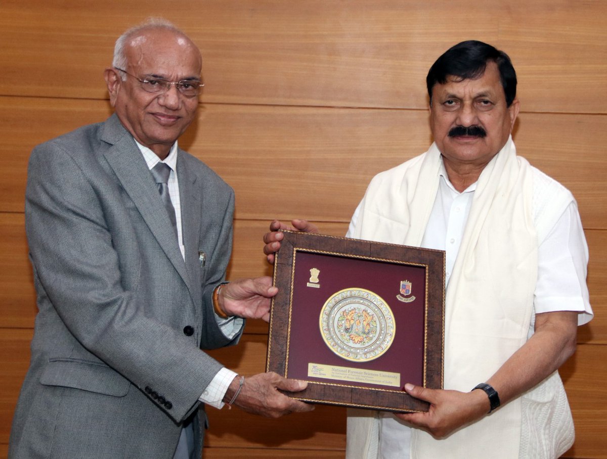 NFSU_Official's tweet photo. H.E. @MilindaMoragoda, Hon. High Commissioner of Sri Lanka, and Shri @JnanendraAraga Ji, Hon. Home Minister of Karnataka visited NFSU on 12th Jan.'23. They met Dr. J.M. Vyas, VC-NFSU, and discussed various topics of Forensic Science &amp; allied subjects with possible collaboration. https://t.co/o49goErQFy