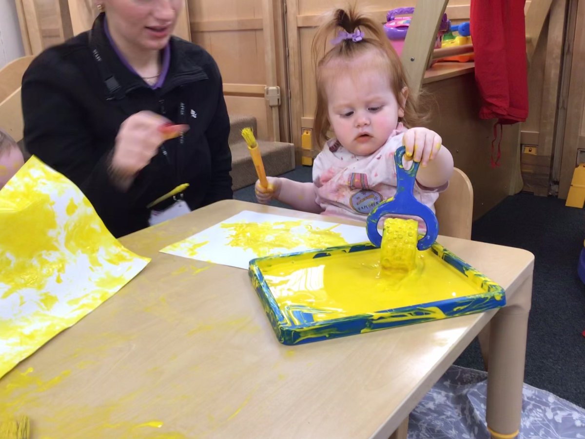 Nurseryboule's tweet photo. The babies enjoying exploring paint feeling the cold texture with their hands. We are starting to introduce different tools they can use in the paint, such as brushes, rollers etc. #SensoryExperience #MessyBabies https://t.co/Op7rY7CMiH