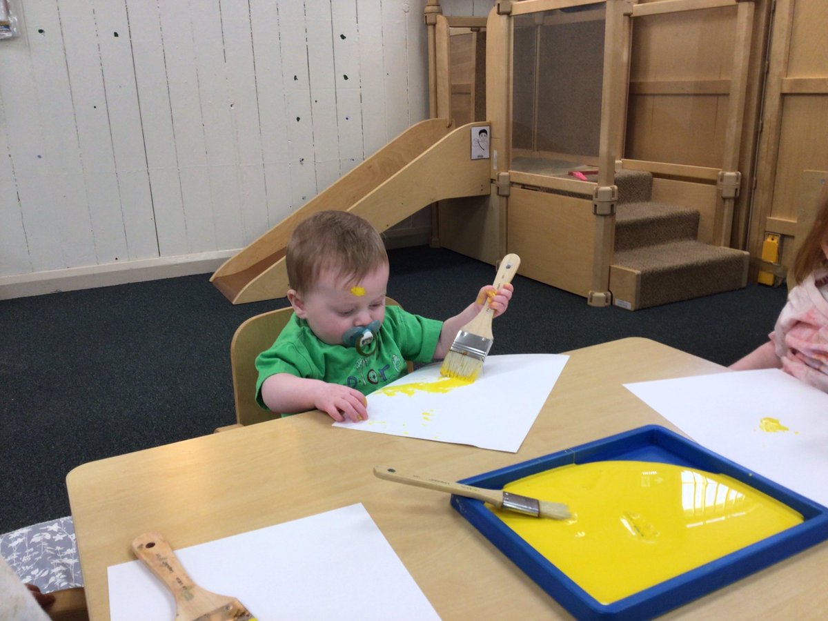 Nurseryboule's tweet photo. The babies enjoying exploring paint feeling the cold texture with their hands. We are starting to introduce different tools they can use in the paint, such as brushes, rollers etc. #SensoryExperience #MessyBabies https://t.co/Op7rY7CMiH