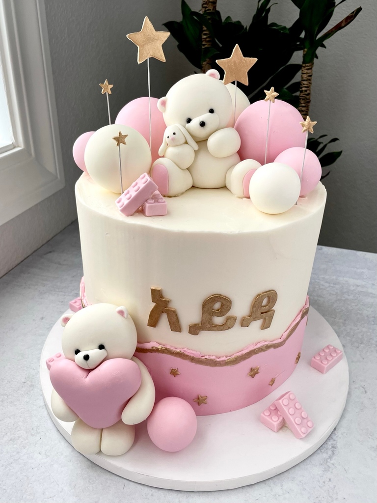 cvapodaca's tweet photo. Close up of Aida's cozy teddy, pink legos, and heart &amp; star themed birthday!🧸💕 Fun fact, the symbols on her cake resemble her name in her Nigerian culture. In love with this party theme by @lizatesfaye #teddycake #firstbirthday #pinkandwhitecake #pinkcake https://t.co/TxcClL3tsx