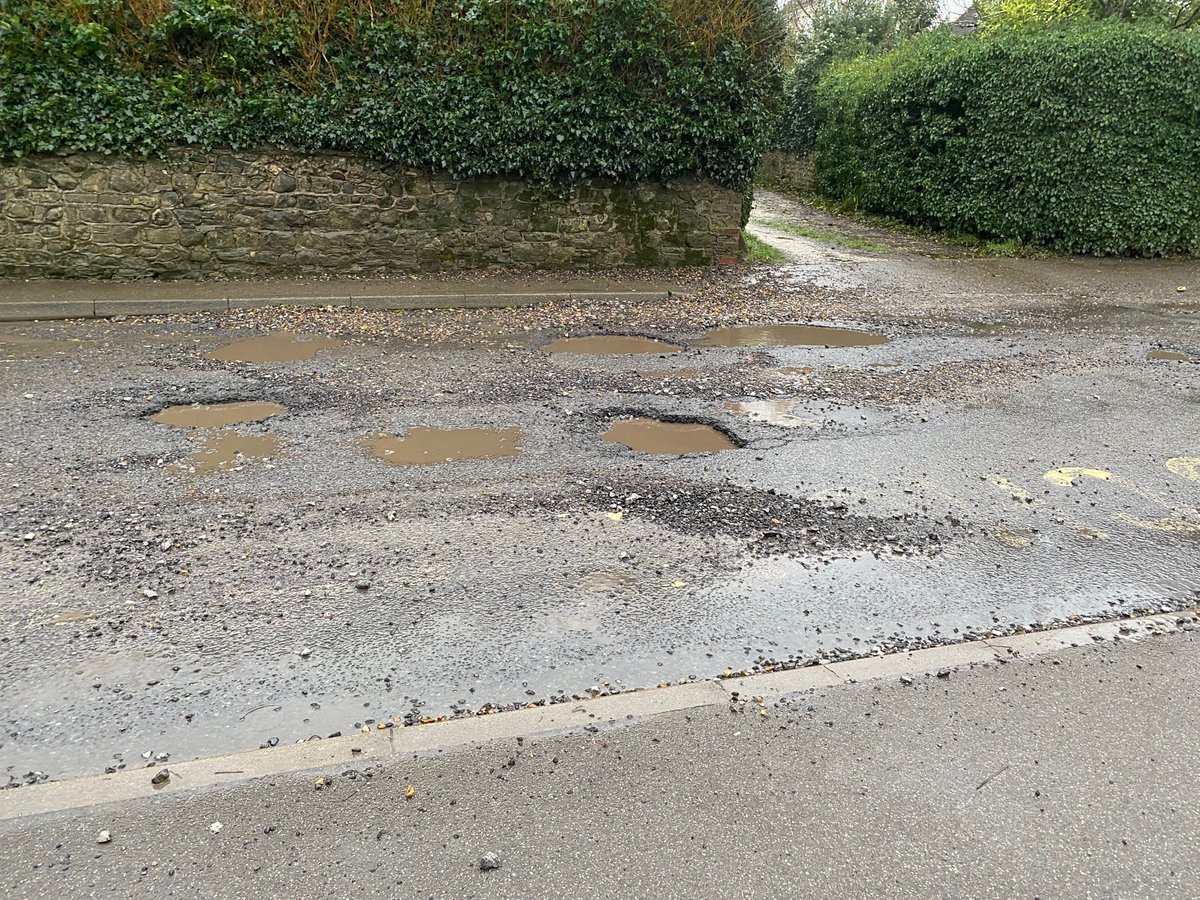 Eva_K15's tweet photo. @WSCCNews If this is not priority, what is? When are you fixing trinity road (hurst) in front of St Lawrence? Cars drive on the pavement,pedestrians getting hit with stones bouncing from cars😡 Parish council informed me this has been reported numerous times! #FixIt https://t.co/ozgiO0nLWH
