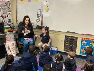Ms. Smith's Kindergarten Aggies welcomed Izzy and Claire's Mom as their reading buddy on Tuesday. The Aggies were inspired by buddy reading, and Aavya decided to read to two friends! #Enter2Learn #Exit2Lead #EdThatAddsUp #WeAreFRCS #ReadingisFun