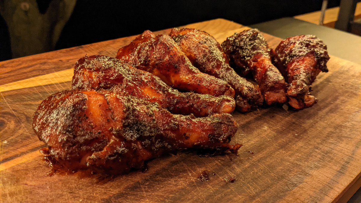 Drumsticks with a nice BBQ crust and a thin glaze of sauce. So cheap, so delicious!