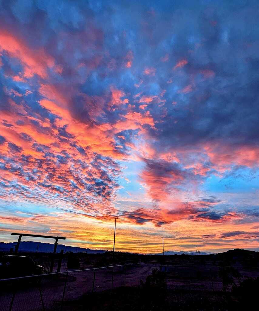 Last night there was a keyhole in the sunset. What lies beyond? #desertlife #desertliving #sunsetsky #mojavedesert #wondervalley