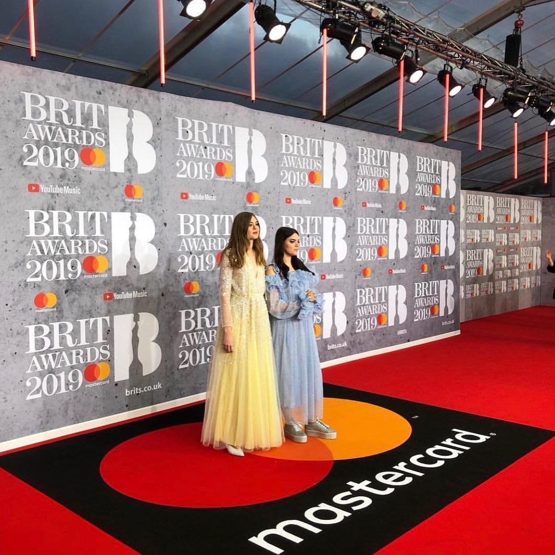 FirstAidKitBand's tweet photo. WOW! We’re thrilled and honored to find out we’re nominated (yet again!) for a Brit Award for Best International Group. 😱 We just finished off an incredible UK tour, it felt really special. We want to thank all our UK listeners for the love and support. 😍🇬🇧🙏✨ #BRITs  @BRITs https://t.co/dWRy6xUU6N