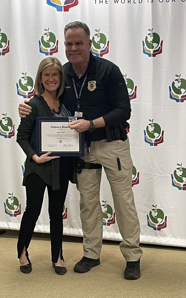 Way to go! Constable Kevin Rodgers presenting Amy Chas with a very important safety medal at our last Board meeting!