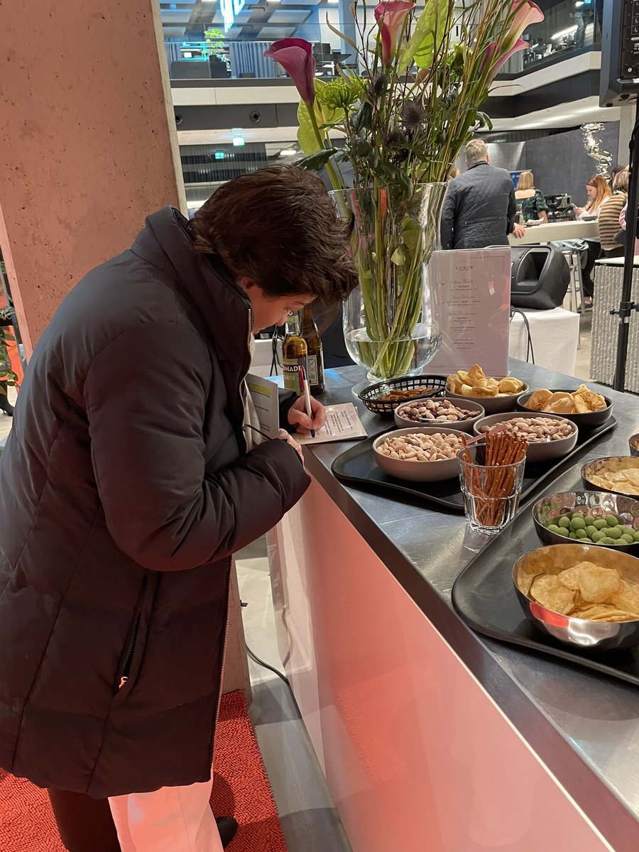 Of course @karaswisher does last-minute edits by the snack station. #dld23