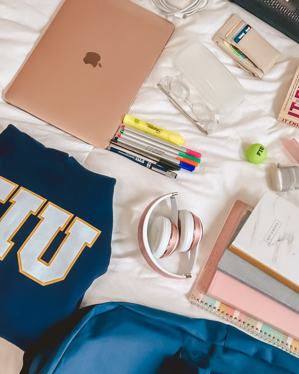 FIU's tweet image. A good read and some headphones for in-between classes 😌

What's your must-have essential to pack in your campus bag? #replytweet