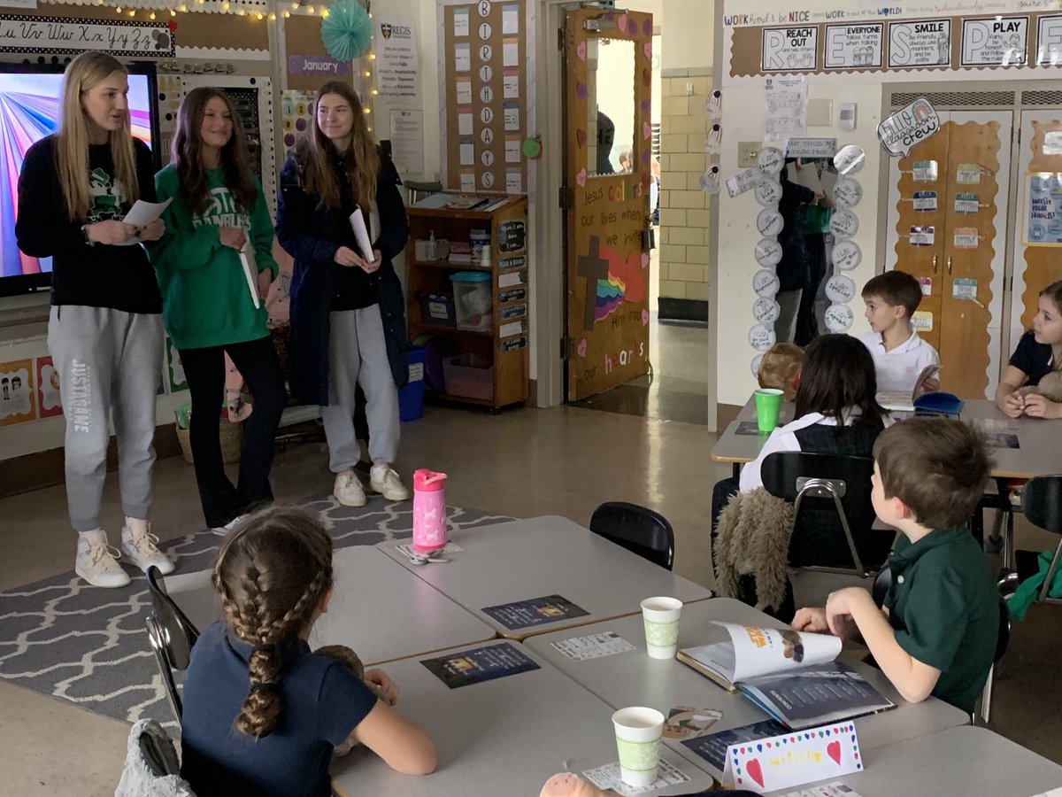 Regis Girls Basketball players building into St James Elementary and St Mary Elementary school students. #thenewera