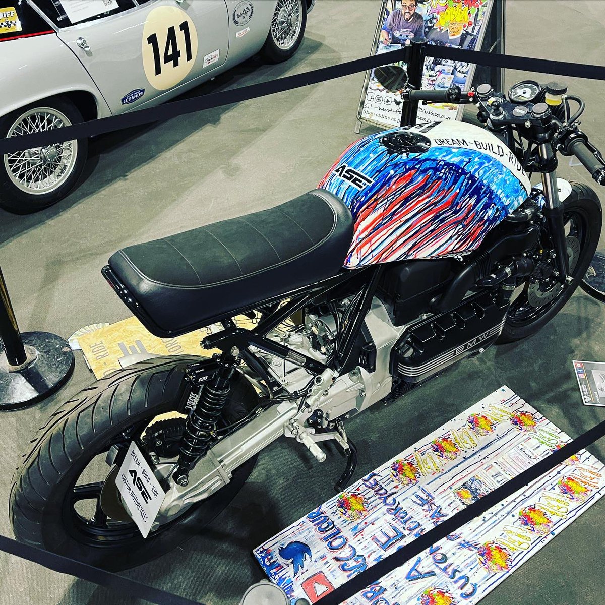 Popbangcolour's tweet photo. It’s super cool to have the custom built @asecustommc on display @Autosport_Show this week.

The 1987 BMW K100 RS with full custom @Popbangcolour paintwork &amp; a list items that make it a 1 of 1 bespoke build.

The art bike is available to buy too #ASEmotorcycles #ASE #ASI23 https://t.co/1Oz9YTego4