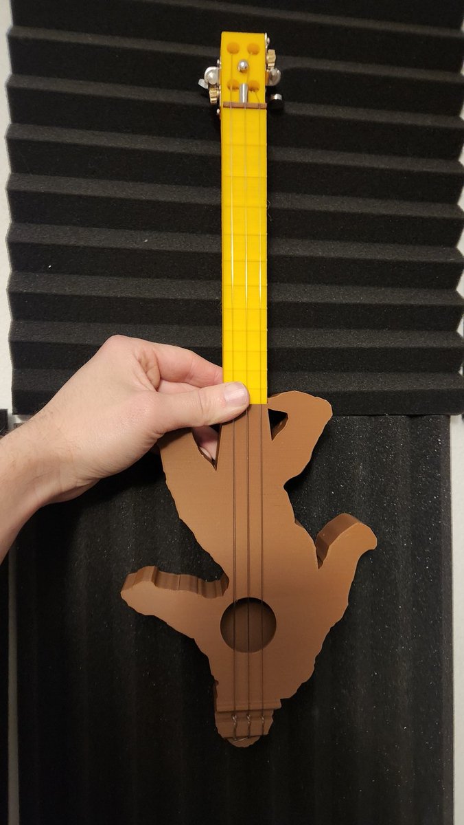 grhmhomelinux's tweet photo. I finished my friend Mike's custom 3 string Satchsquatch guitar #3dprinted #Fusion360 #cad #Satchsquatch #bigfoot #3string #3stringguitar #ukulele #cigarboxguitar I printed the neck in Polymaker Pro Pla Yellow. Strings used: D'Addario titanium soprano strings https://t.co/DXdFwYy1lR