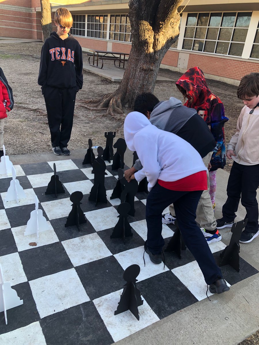 We took Chess Club outside today to try out our custom-made board and pieces thanks to our local Boy Scouts! They were especially excited to try castling. ♟️ <a href="/PCES_Panthers/">Park Crest ES</a>