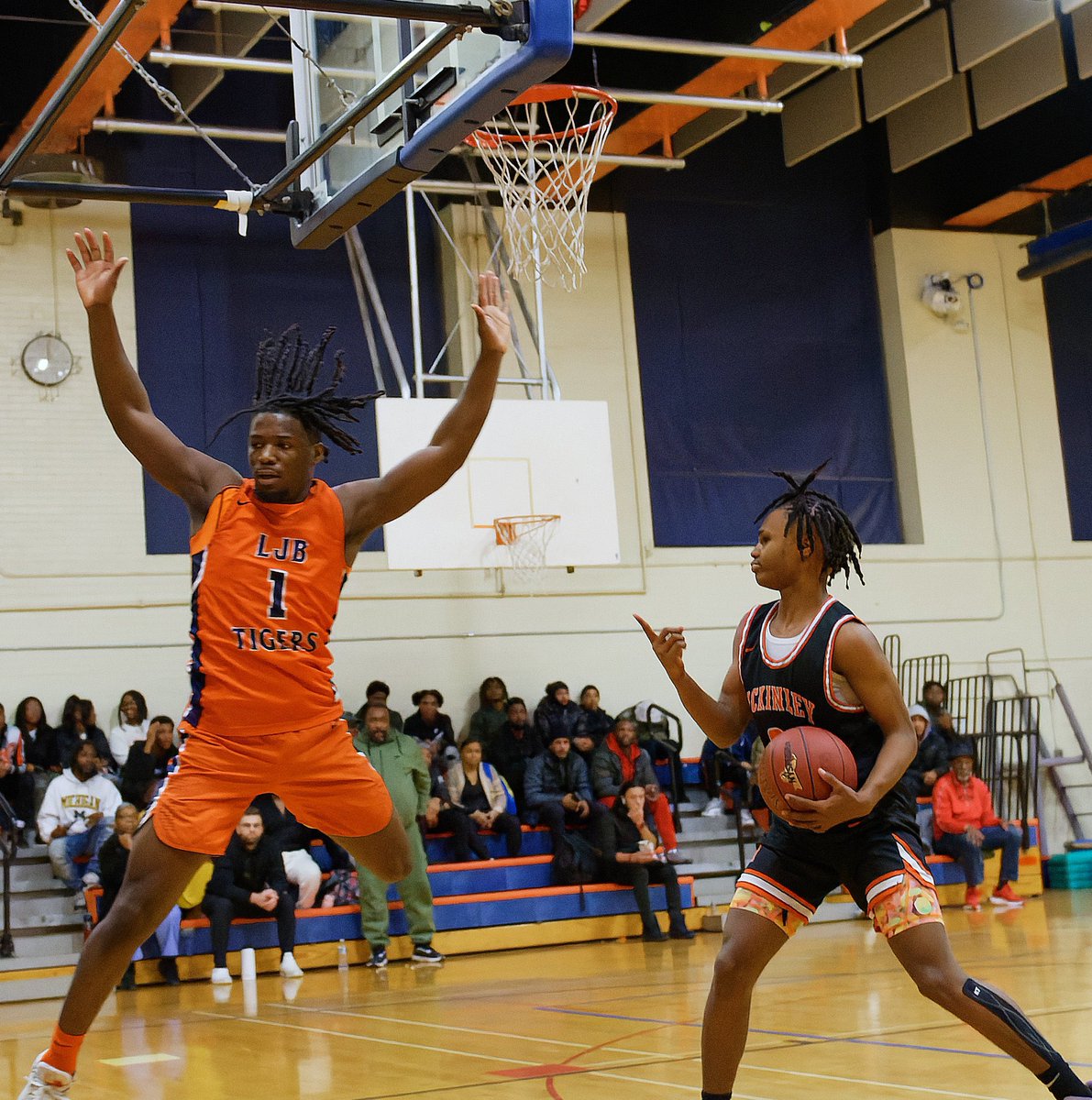 Whether driving to the basket, blocking shots, drawing charges, or just trying to impress McKinley’s Mekhi Williams with his tricks during the game, Jayden Lewis is a player to watch at Bennett