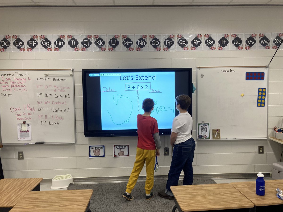 Battle of the Boy Brains today in Math!  We are working on a new skill and I caught these two COLLABORATORS in action! <a href="/BGESTEM/">Ball Ground STEM Academy</a> #STEMfortheWIN #mathwork #BGrocks
