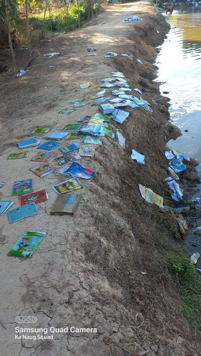 pyaezone's tweet photo. Min aung hlaing's terrorists not only burn down houses, but they also destroy anything that would go against them.. like children school books. The villagers had to save as many as they could from the river so their children can go to school. Barbaric!

https://t.co/WUdAGbLHol https://t.co/ez5fvebWI8