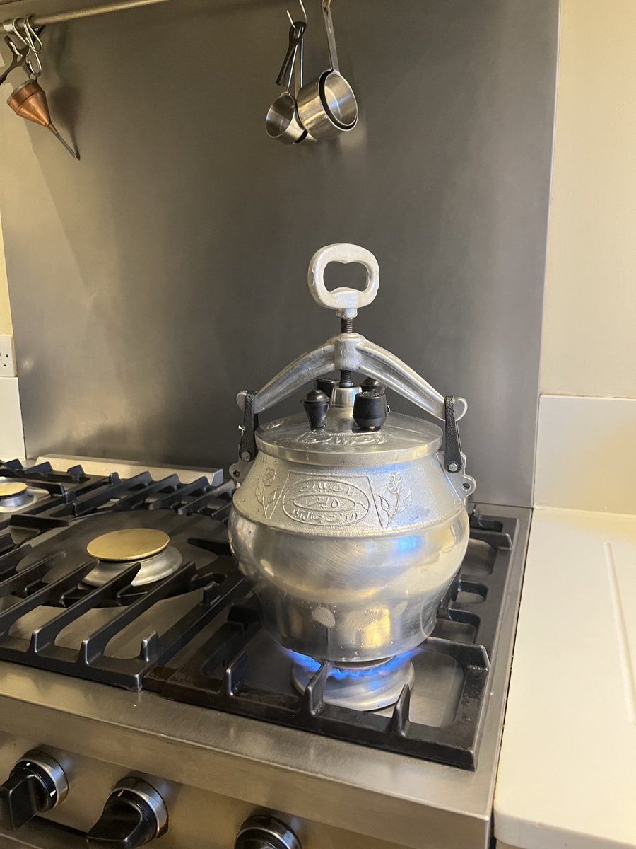 Cooking chana dal in the pressure cooker I bought in Afghanistan. Always nerve wracking as it starts to roar like a dragon. Any tips about how long to keep the heat on, to avoid explosions?