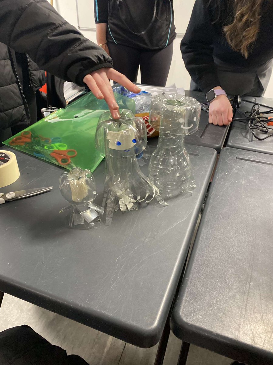 StDavidsGreenS1's tweet photo. On Friday morning , a group of students from the green schools committee recycled plastic water bottles into jellyfish . This raised awareness for the damage plastic does to marine life.#plasticjellyfish #climateactionweek https://t.co/WgtsdD8MVm
