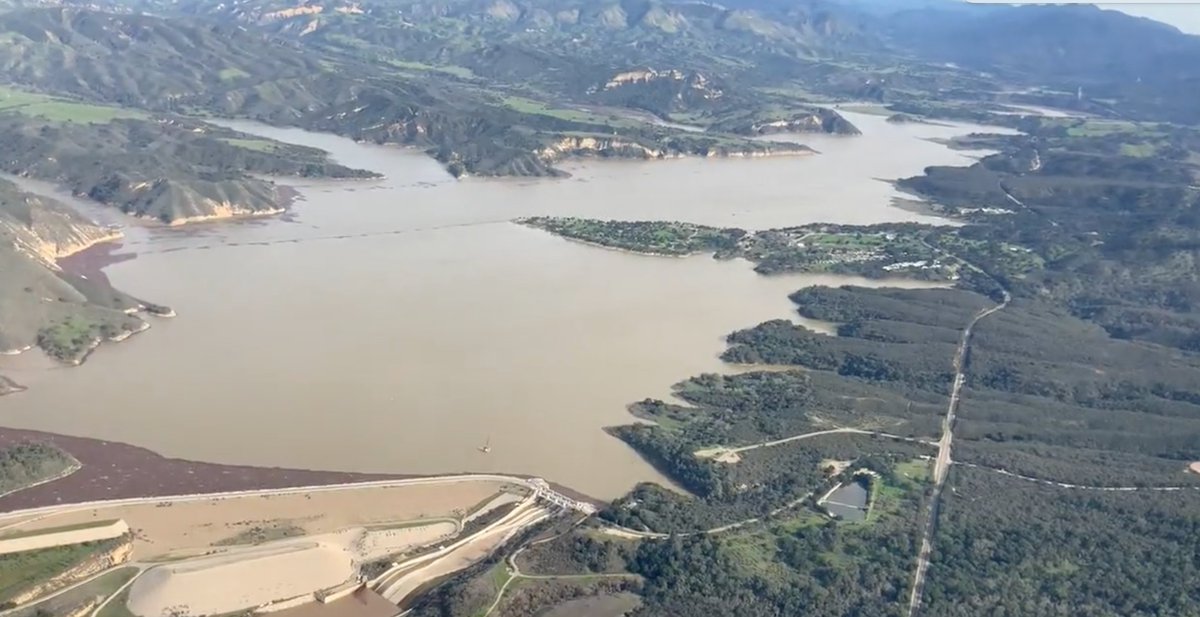 JohnPalminteri's tweet photo. For the first time since 2011 CACHUMA LAKE in Santa Barbara County, a primary water supply for areas like 
Goleta, Santa Barbara, Montecito, Carpinteria and the Snta Ynez Valley is at capacity.  It will spill Saturday morning.  (Photos: Scott G. Dweck) https://t.co/3ZjodOE1P2