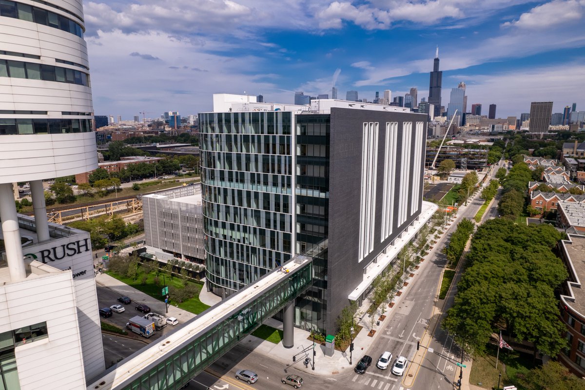 RushMedical's tweet photo. The ribbon-cutting ceremony for the new Joan and Paul Rubschlager Building is underway. RUSH staff, faculty and students are in attendance for a sneak preview of the new building — home to the RUSH Cancer Center, neurosciences, digestive diseases and more. #BuildingRUSH https://t.co/GjrtEVqIsv