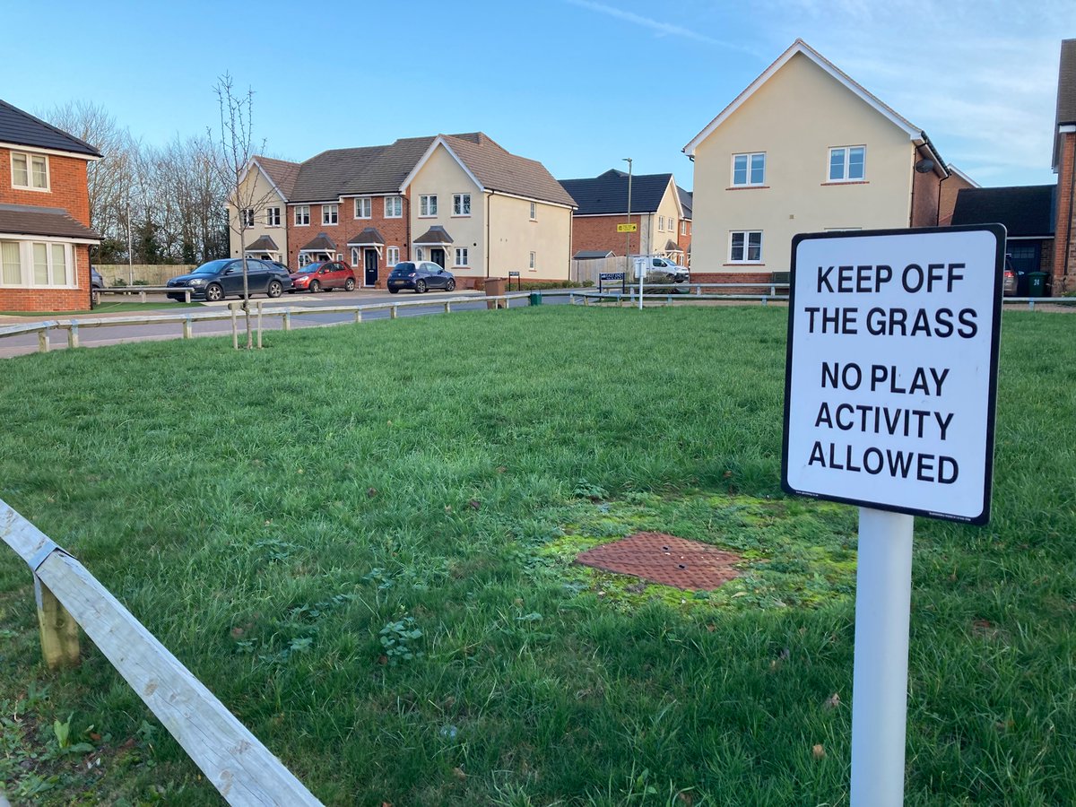 The largest bit of greenspace on this new housing development, just 16 x 16 m of grass. And children playing on it is specifically banned.