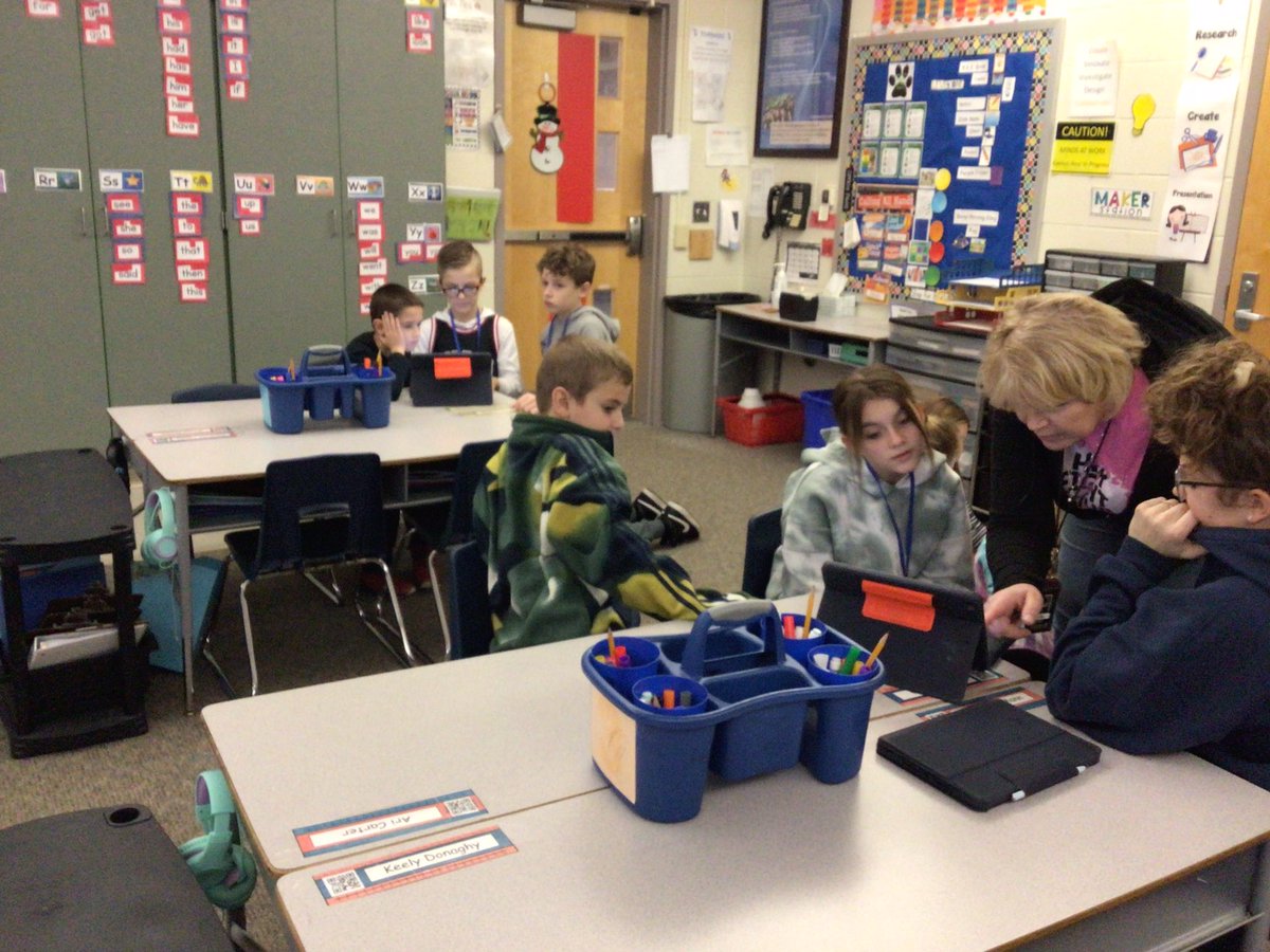 ElzeyMrs's tweet photo. We are enjoying exploring different kinds of Penguins with our 5th grade buddies! https://t.co/0Q699eEDjg